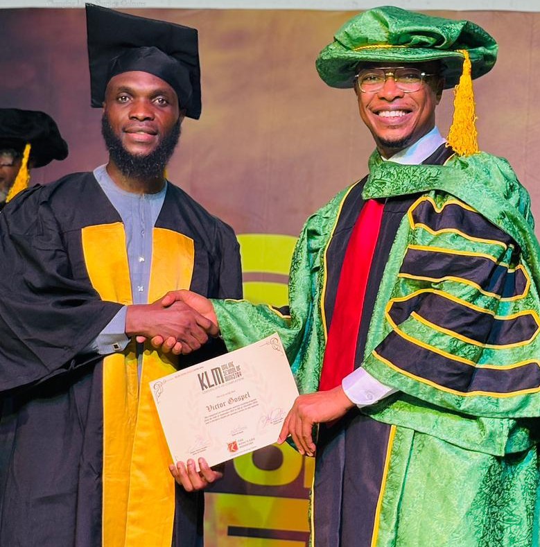 Victor Gospel receiving a Certificate of Completion at Camp Meeting 2026